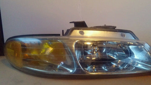 Clean PREMIUM Dodge Caravan 1996 through 2000 headlight assembly left and right.