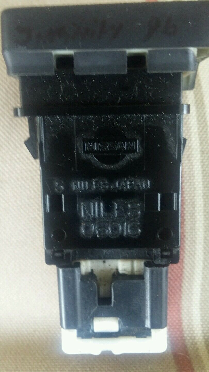 1996  OEM Infiniti  emergency Hazard switch 5y06u IN GOOD CONDITION