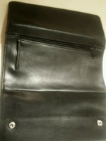 Brand star black leather snap wallet with snap closure.