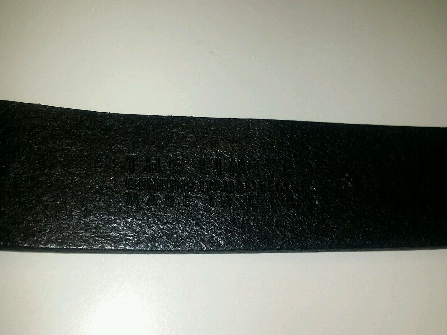 The limited black leather sequin solid brass buckle.