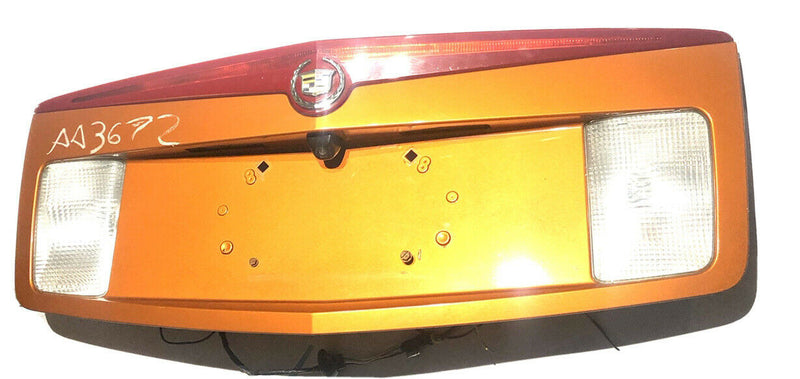 03-07 Cadillac CTS Trunk Tail Panel Reverse Brake Light License Bezel Trim Orang