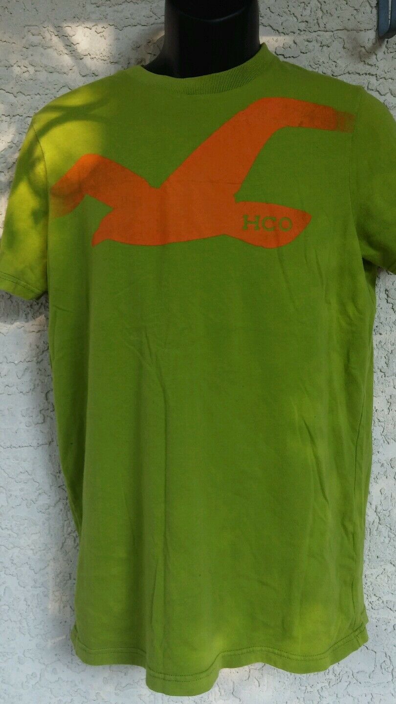 Green Tshirt 100% cotton size large with orange logo
