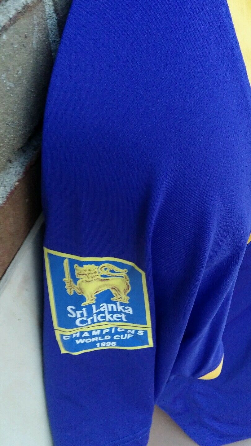 Tshirt blue color size M all sports with some yellow in it