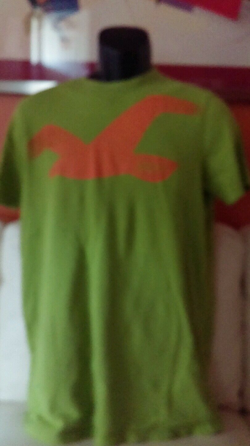 Green Tshirt 100% cotton size large with orange logo