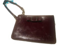 COACH WINE BURGUNDY WRISTLET WITH STUNNING BOW ACCENT- GORGEOUS! by Coach