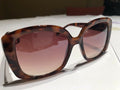 a Brown Tortoise Shell Plastic Holiday Over Sized Square Sunglasses In Case