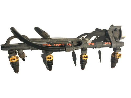 1991-1994 VOLVO 740 FUEL RAIL WITH 4-SETS OF INJECTORS & FUEL PRESSURE REGULATOR by Volvo