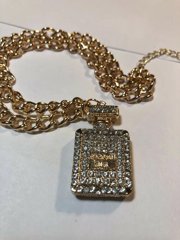 Gold Perfume Botyle Necklace Pendant by DALEY1DEALS,LLC.