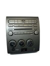 2004-2005 Nissan Armada climate 6-disc stereo control faceplate wood grain bezel