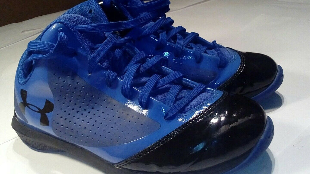 under Armour blue and black high top tennis sjoes size 5.5