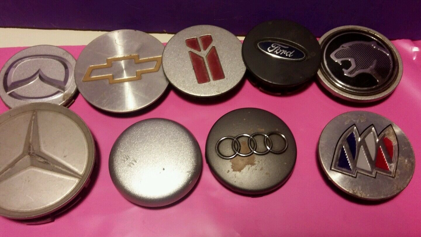 Hubcaps/center caps car variety of brands.