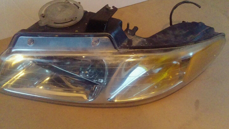 Dodge Caravan headlight assembly the left hand side 96 through 2000