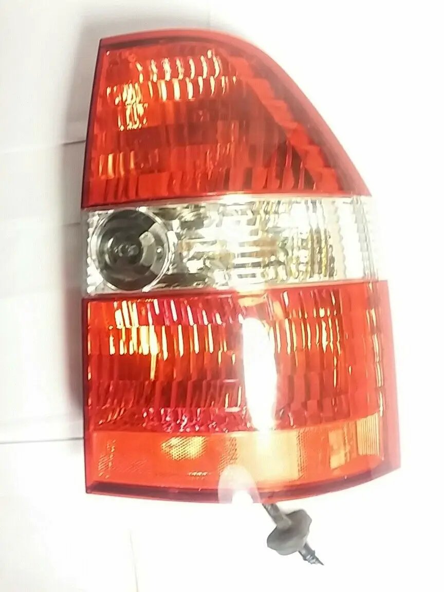 R, Tail Lamp Assembly Rear, OEM Passenger Side,WITH BULBS & WIRES 1157NA,W21/5W by HONDA/OEM