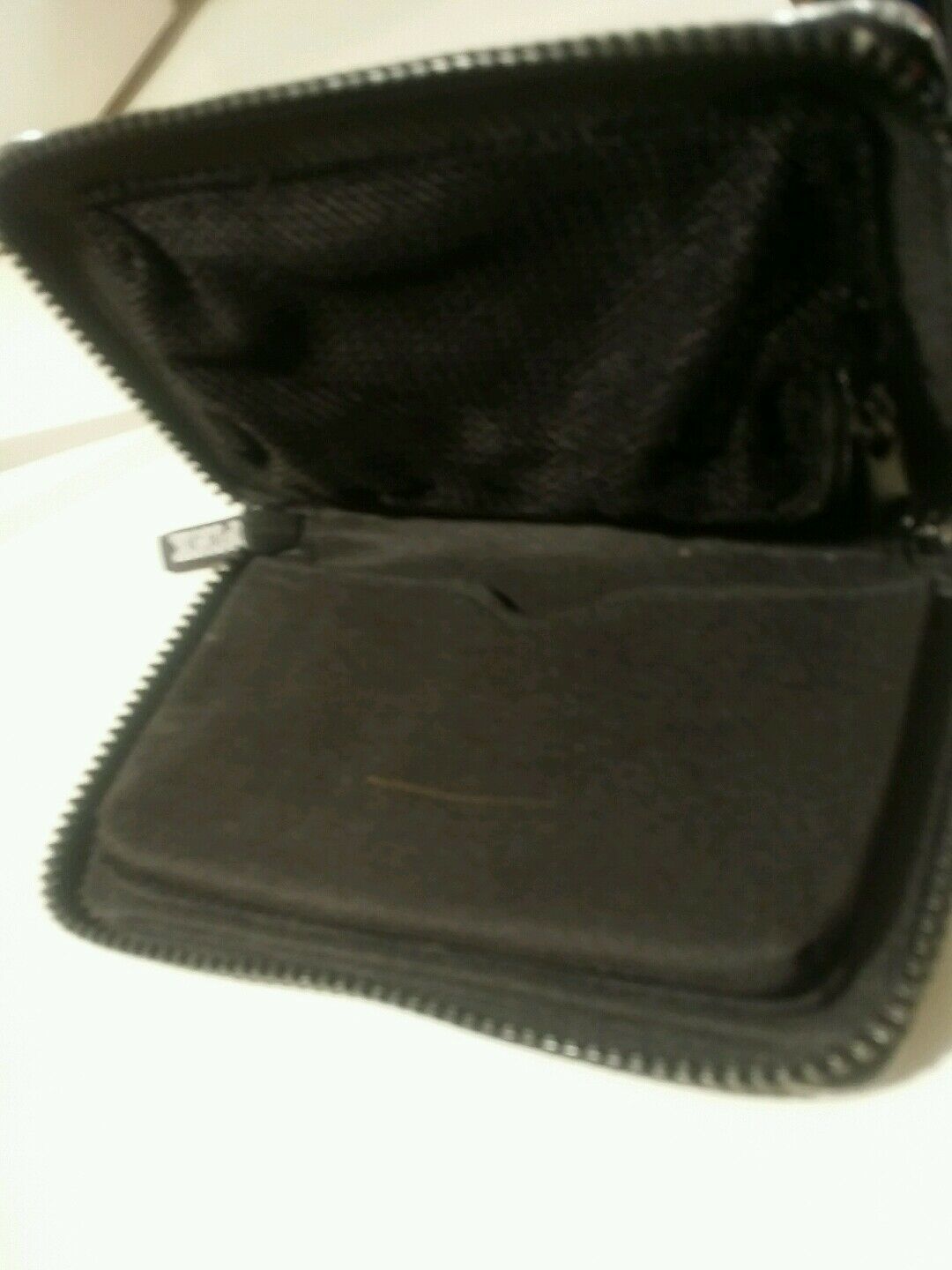 silver metallic zip around love pink clutch