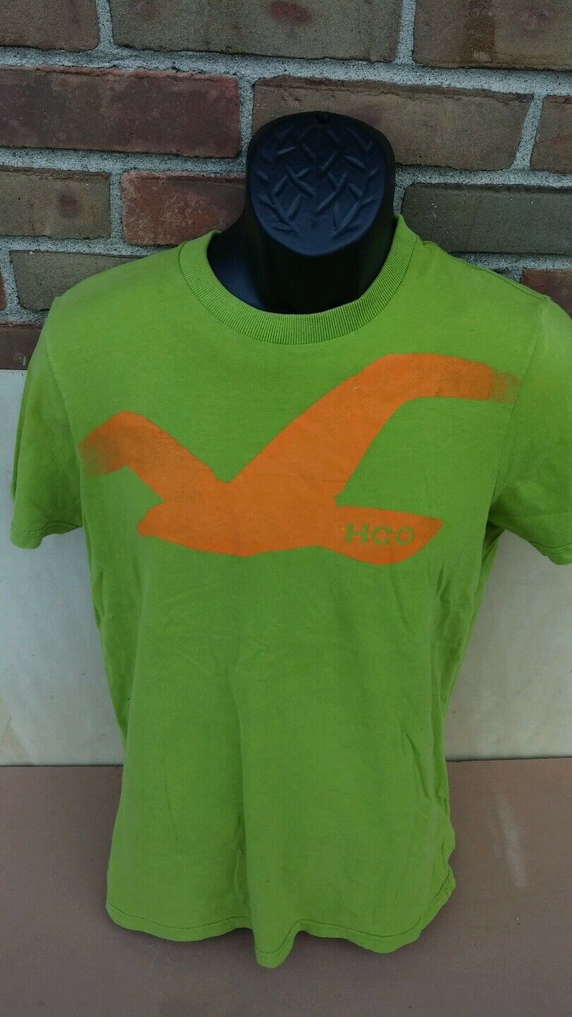 Green Tshirt 100% cotton size large with orange logo