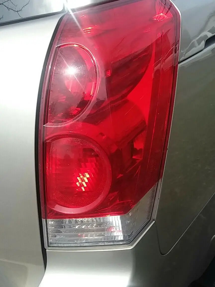 Tail Light for 2004-2009 Nissan Quest Passenger Side (RH) ASSEMBLY WITH BULBS OE by OEM NISSAN ORIGIN