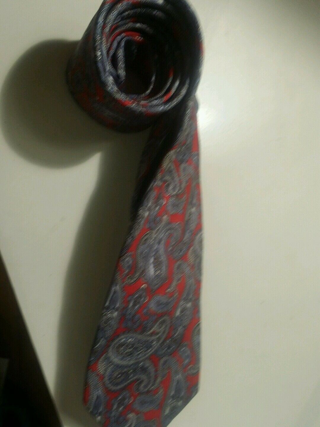 Christian dior multi colored paisley print stunner tie.