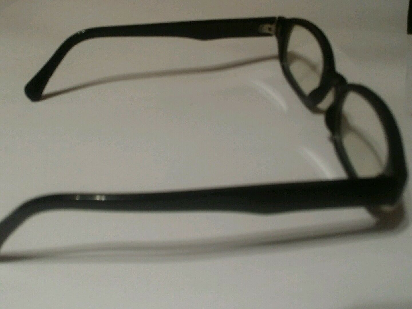 Black oval eyeglass frames