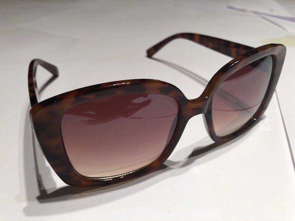 a Brown Tortoise Shell Plastic Holiday Over Sized Square Sunglasses In Case