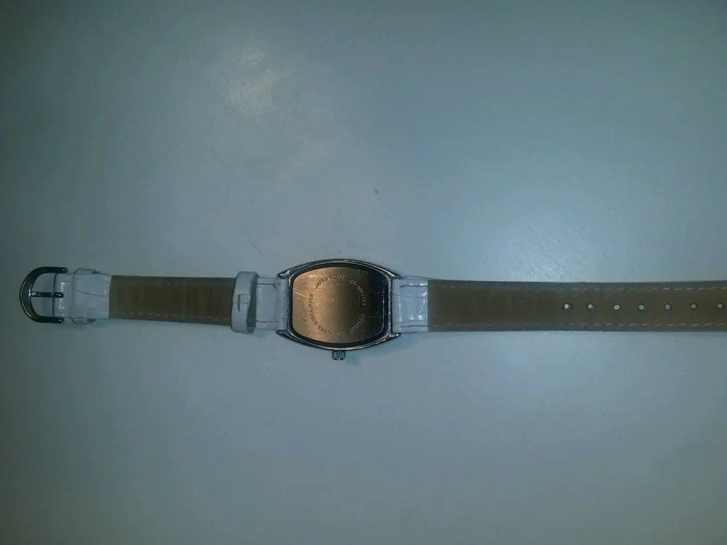 white quartz watch multi colored numerical batteries n/a by DALEY1DEALS,LLC.