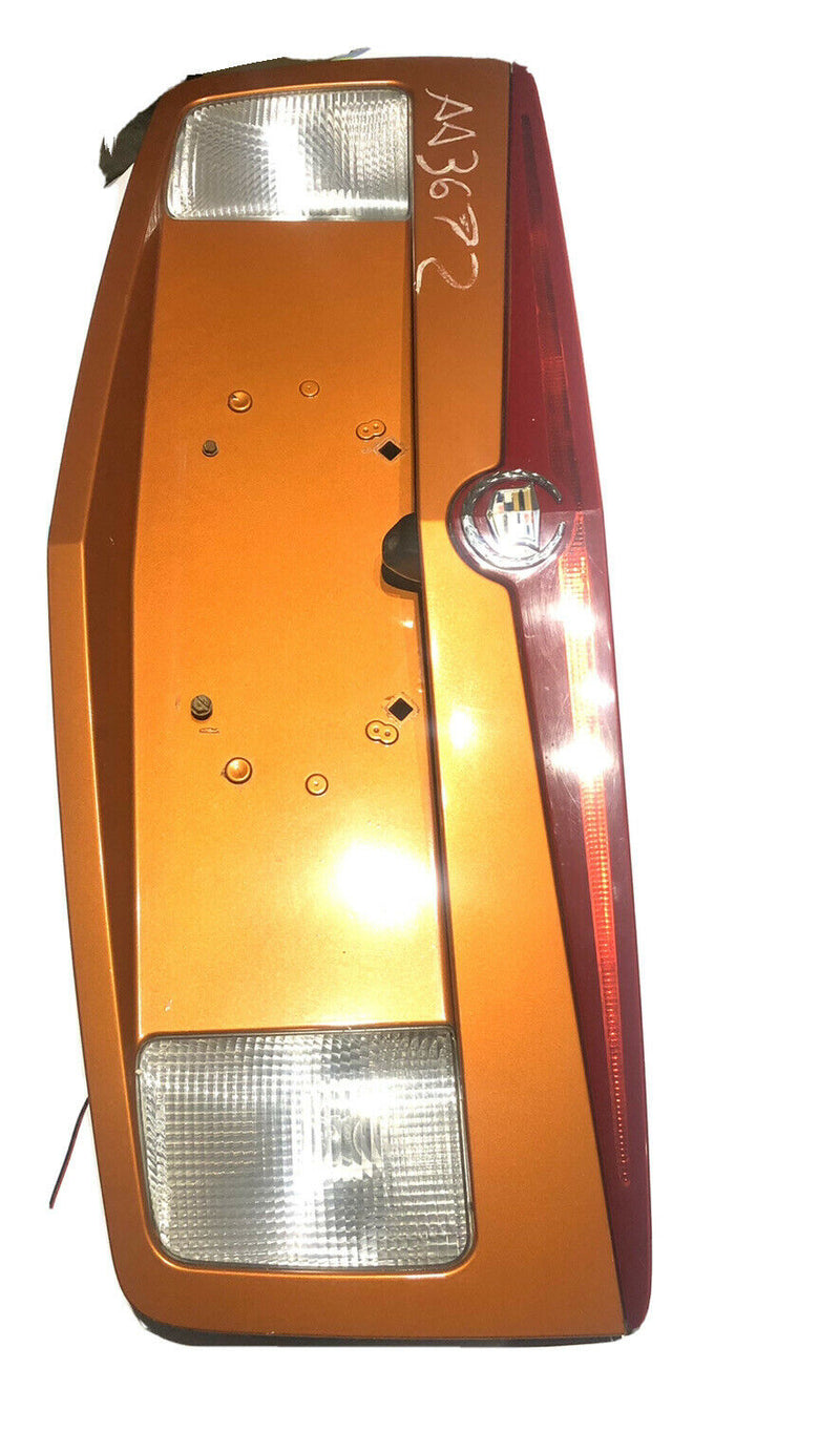 03-07 Cadillac CTS Trunk Tail Panel Reverse Brake Light License Bezel Trim Orang