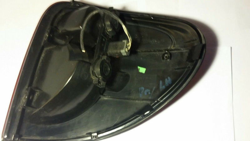 2001-06 LH tail light assemble driver side 4857601A  H/ CC19284  3934-04