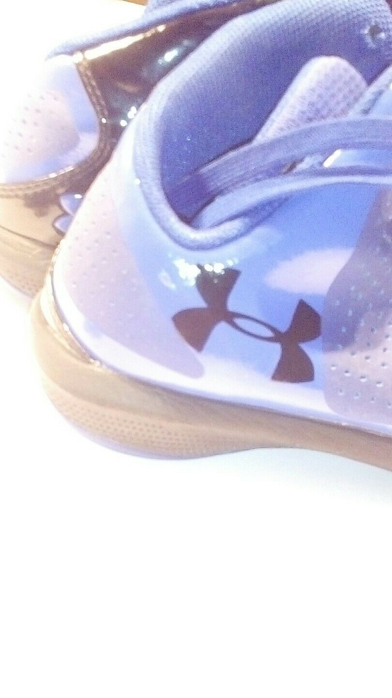 under Armour blue and black high top tennis sjoes size 5.5