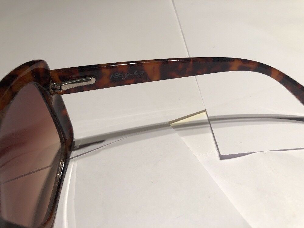 a Brown Tortoise Shell Plastic Holiday Over Sized Square Sunglasses In Case