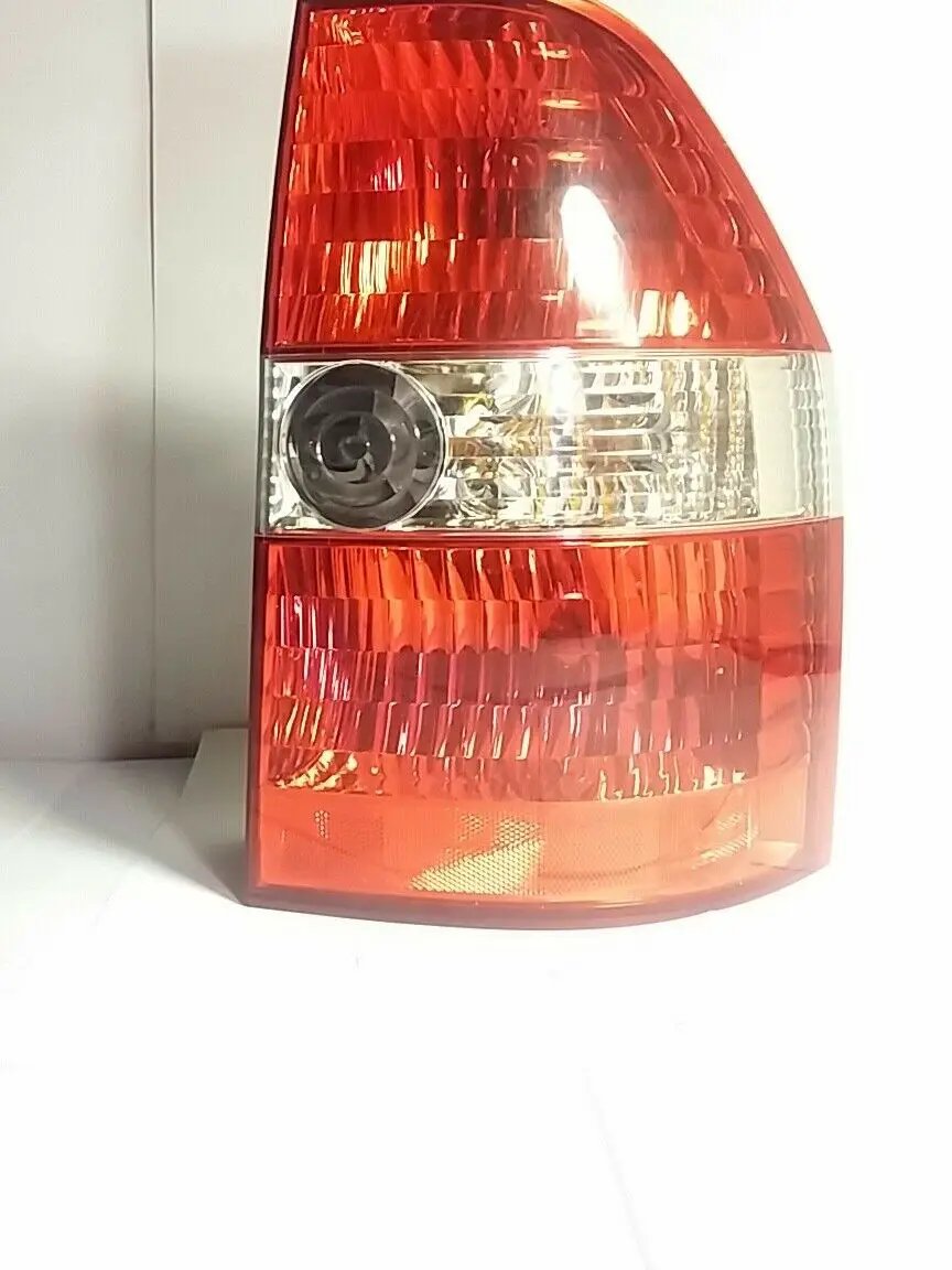 R, Tail Lamp Assembly Rear, OEM Passenger Side,WITH BULBS & WIRES 1157NA,W21/5W by HONDA/OEM