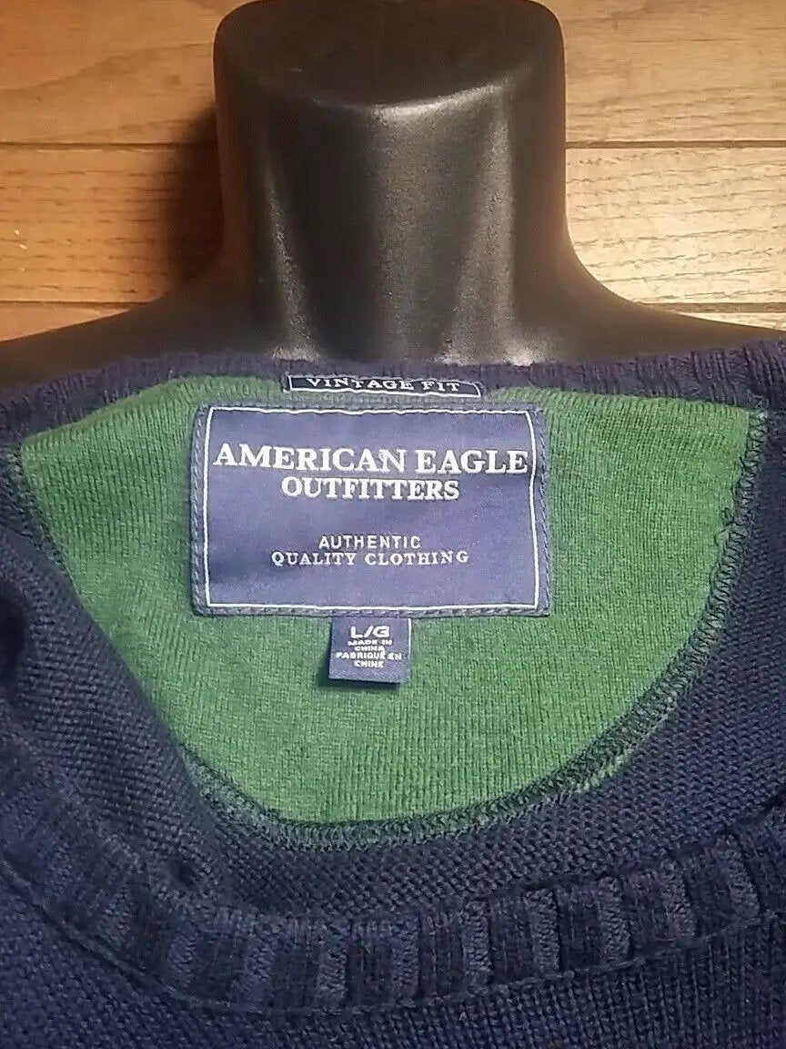 American Eagle large navy blue sweater with a green eagle. by American Eagle Outfitters