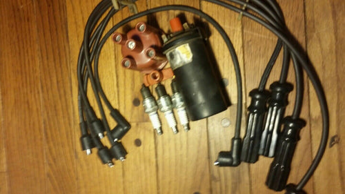 1993 VOLVO 240 COMPLETE 4 SPARK PLUGS PLUS 5 WIRES, ROTOR & CAP DISTRIBUTOR SET