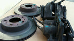 1990 OEM VOLVO 740 COMPLETE BREAK SYSTEM CALIPERS ROTORS PADS BOLTS  PISTONS