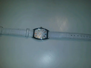 white quartz watch multi colored numerical batteries n/a