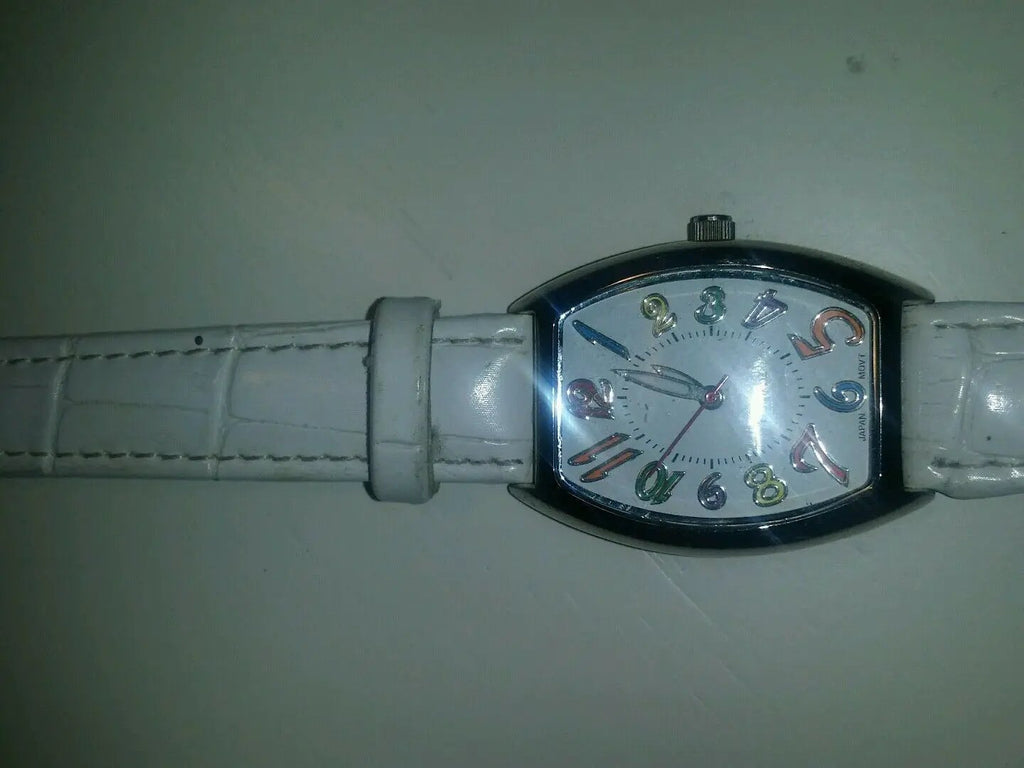 white quartz watch multi colored numerical batteries n/a by DALEY1DEALS,LLC.