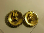 rare exotic gold plated Egyptian print clip on earrings.