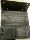 Brand star black leather snap wallet with snap closure.