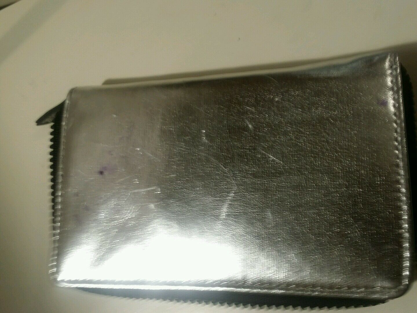 silver metallic zip around love pink clutch