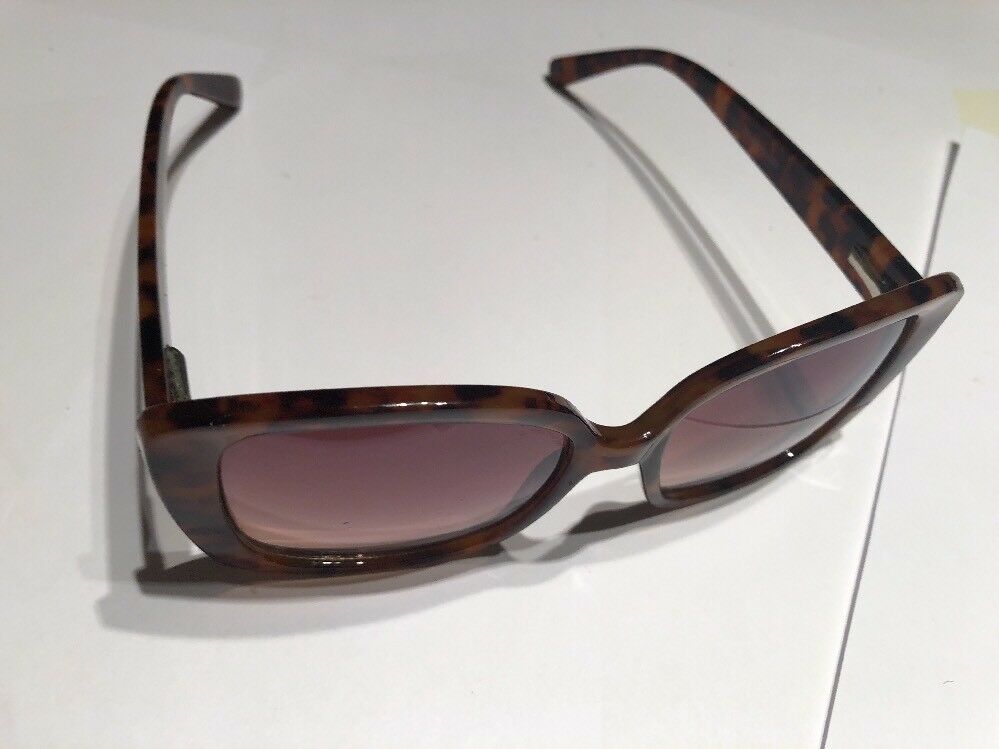 a Brown Tortoise Shell Plastic Holiday Over Sized Square Sunglasses In Case