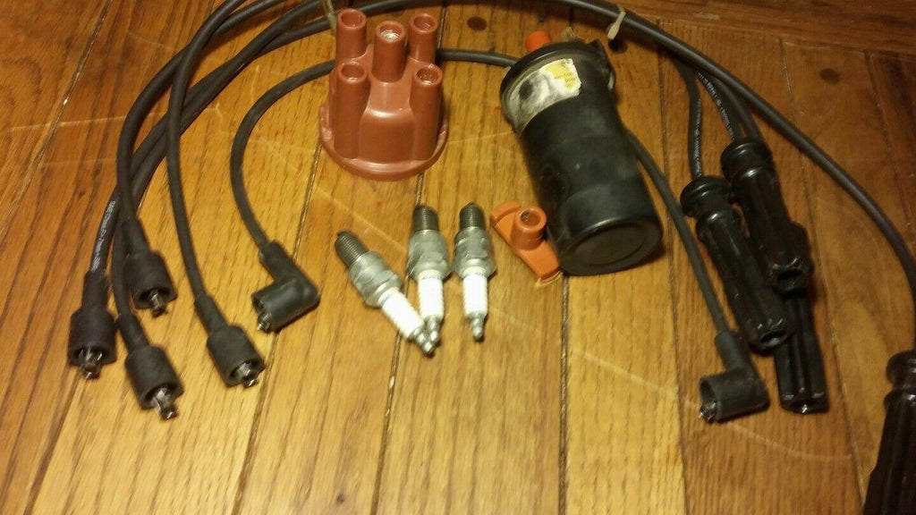 1993 VOLVO 240 COMPLETE 4 SPARK PLUGS PLUS 5 WIRES, ROTOR & CAP DISTRIBUTOR SET