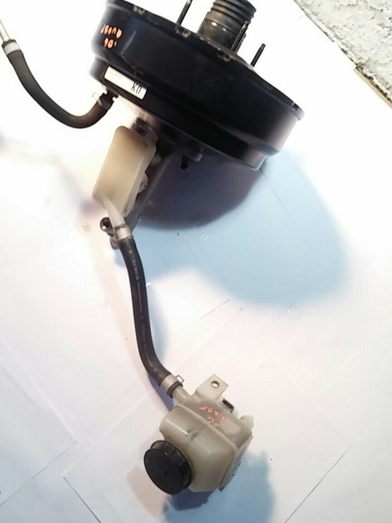 2004-2006 NISSAN QUEST OEM BRAKE BOOSTER MASTER CYLINDER ASSEMBLY W/ RESERVOIR