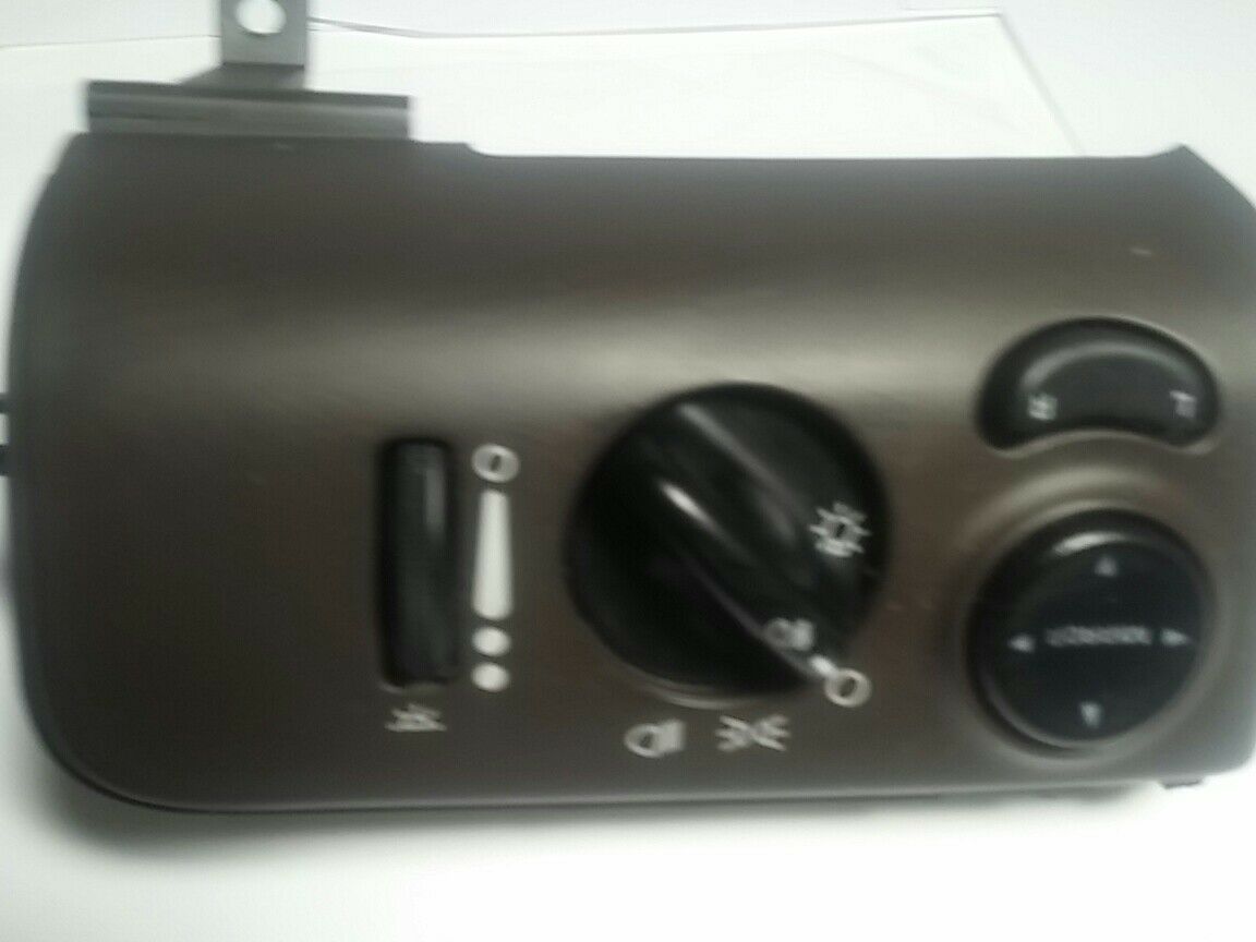 Slightly used brown, GRAND DODGE CARAVAN TOWN COUNTRY CRYSLER HEADLIGHT SWITCH