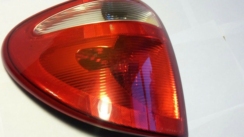 2001-06 LH tail light assemble driver side 4857601A  H/ CC19284  3934-04